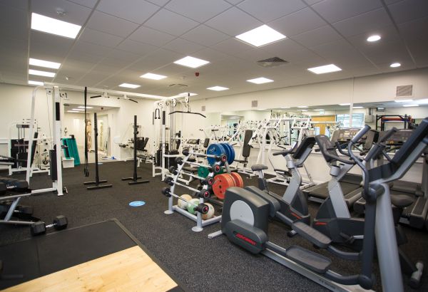 Refurbished gym facilities containing weights and exercise equipment