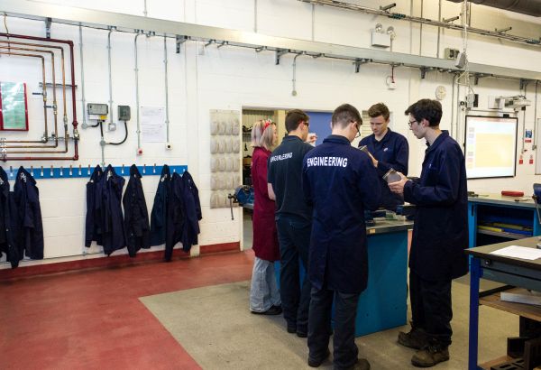 Group of engineering students in the workshop