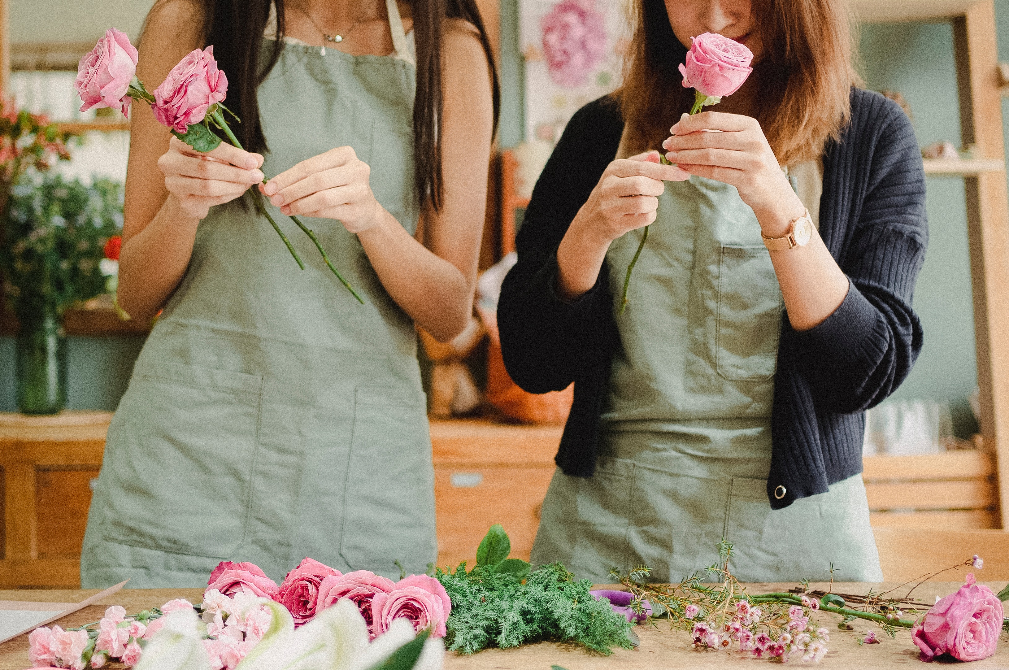 Two Women Making a Flower Bouquet